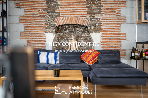 Appartement d&rsquo;exception de 104,18 m² : alliance de la pierre, de la brique et du design contemporain