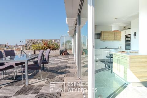 Penthouse lumineux à la vue panoramique et son garage XXL