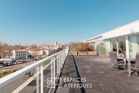 Penthouse lumineux à la vue panoramique et son garage XXL