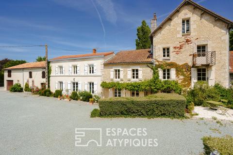 Ancien moulin aux maisons de charme et ses dépendances