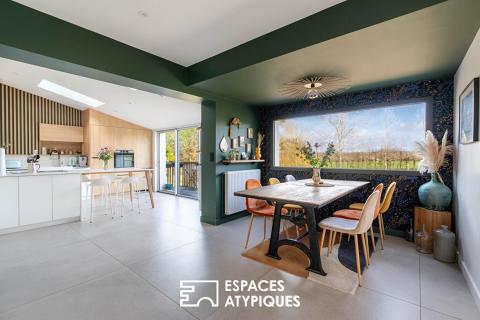 Maison familiale contemporaine et son horizon préservé