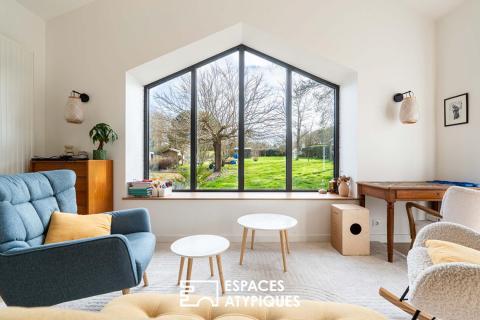 Maison familiale contemporaine et son horizon préservé