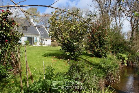 Maison familiale avec jardin d&rsquo;hiver et jardin arboré