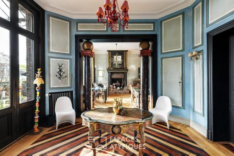 A renovated 19th-century residence in the heart of its private park