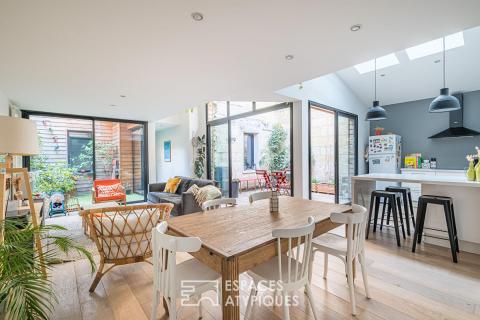 Loft en rez-de-chaussée avec terrasse et grand garage