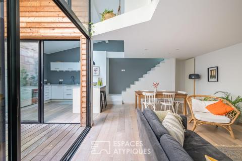 Loft en rez-de-chaussée avec terrasse et grand garage