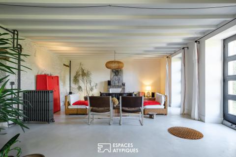 Maison de caractère entre béton et pierres au coeur du Marais