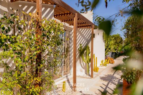 Contemporary villa with safari touches, swimming pool and tennis court