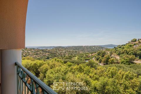 Golf-view duplex with terraces and a glimpse of the sea