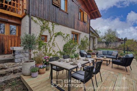 Maison aux allures de chalet avec dépendances
