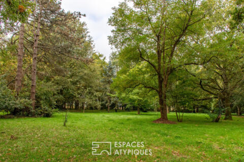 Grande demeure au coeur de son parc forestier