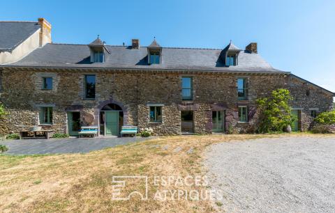 Large 17th-century stone family home and its outbuilding