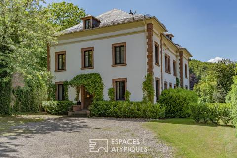 Renovated mansion with a picturesque garden
