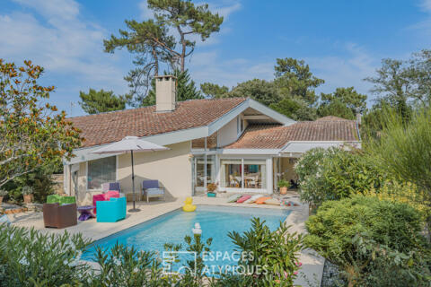 Architect-designed house with swimming pool in a verdant setting