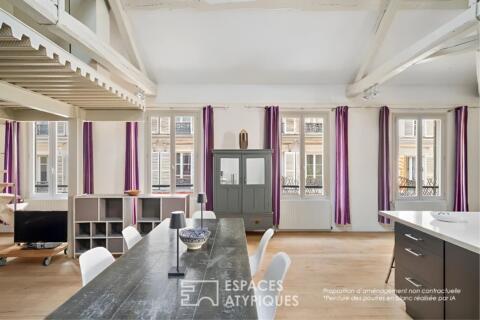 Loft en étage avec charpente apparente aux Batignolles