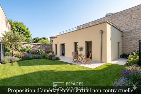 Appartement en rez-de-jardin en plein centre ville
