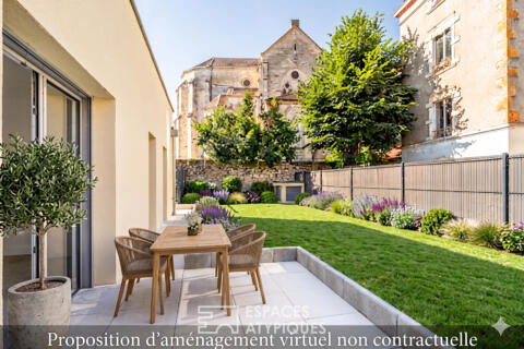 Appartement en rez-de-jardin en plein centre ville
