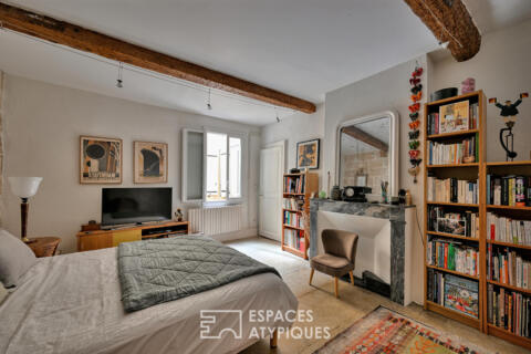 Appartement traversant à l’âme de pierre au cœur de l’Écusson
