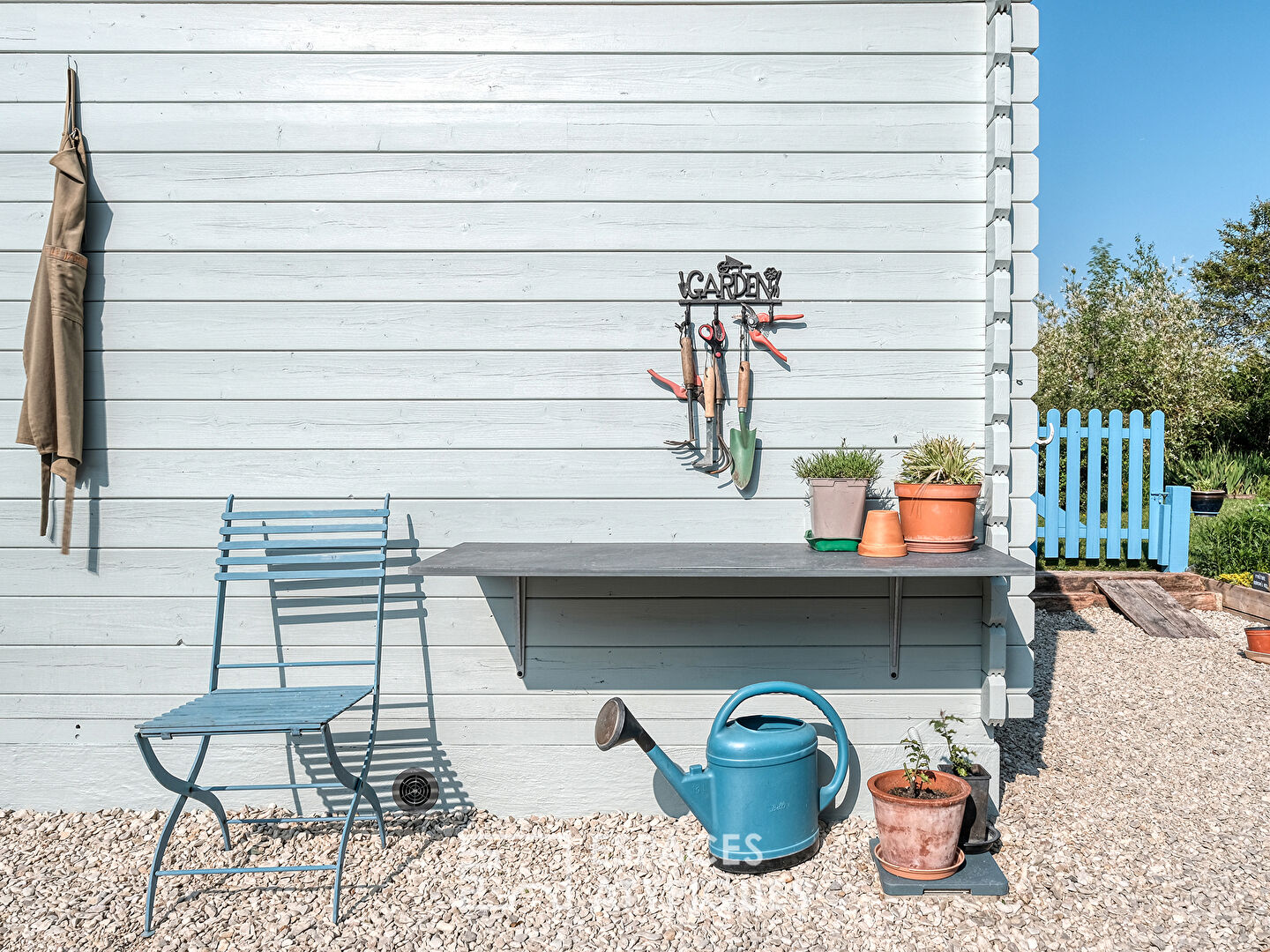 Maison à ossature bois au jardin paysager