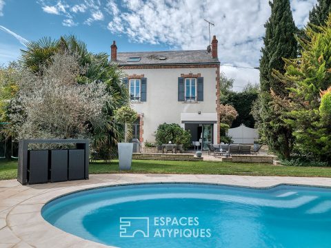 Old house with contemporary renovation and its green setting