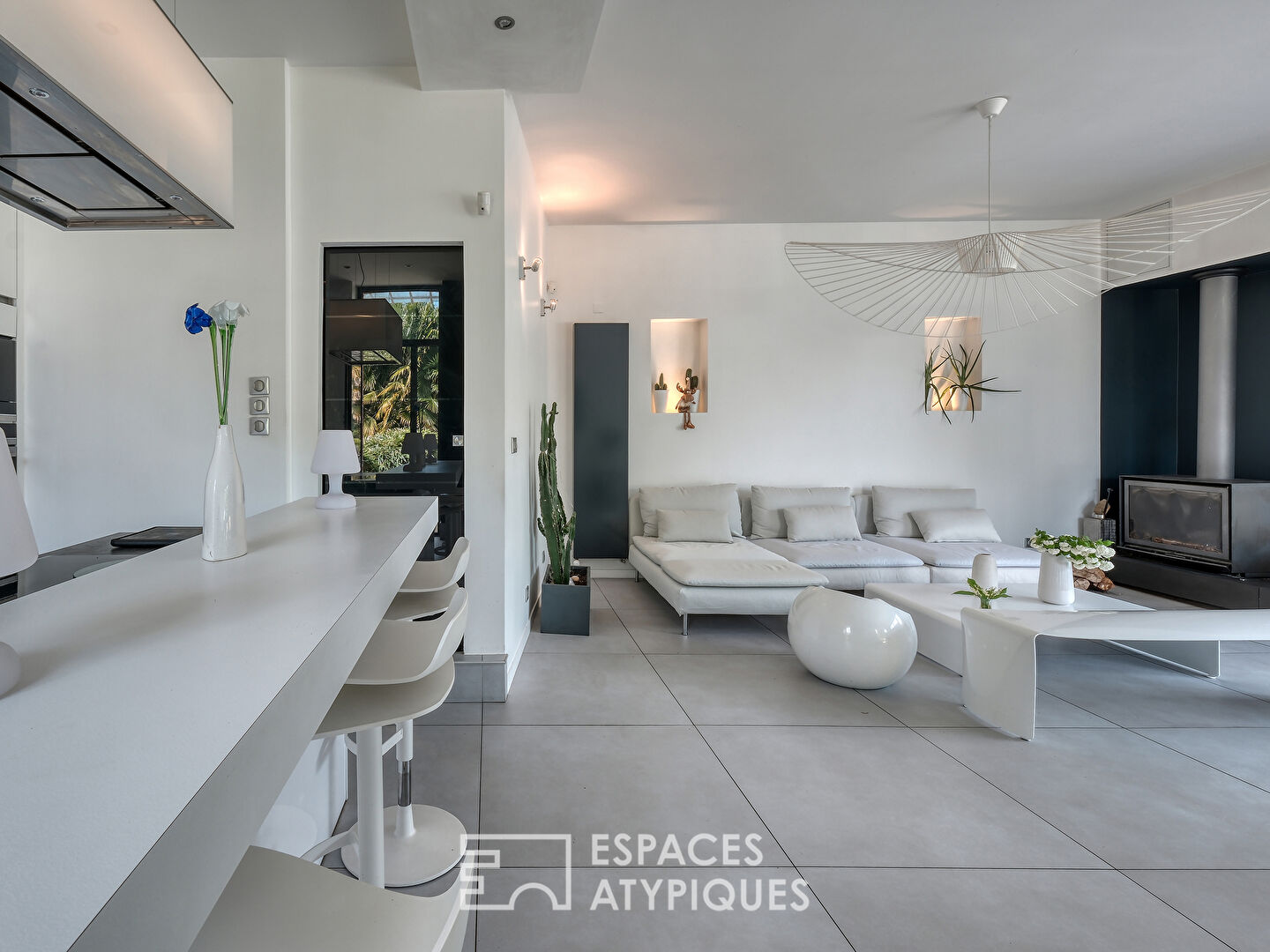 Old house with contemporary renovation and its green setting