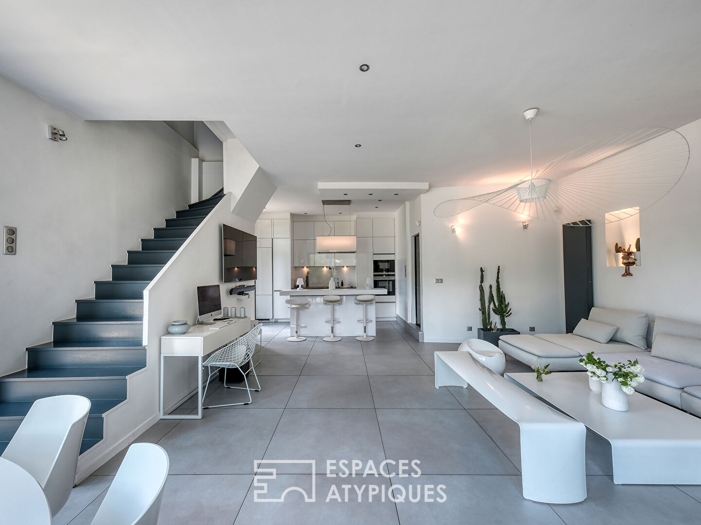 Old house with contemporary renovation and its green setting
