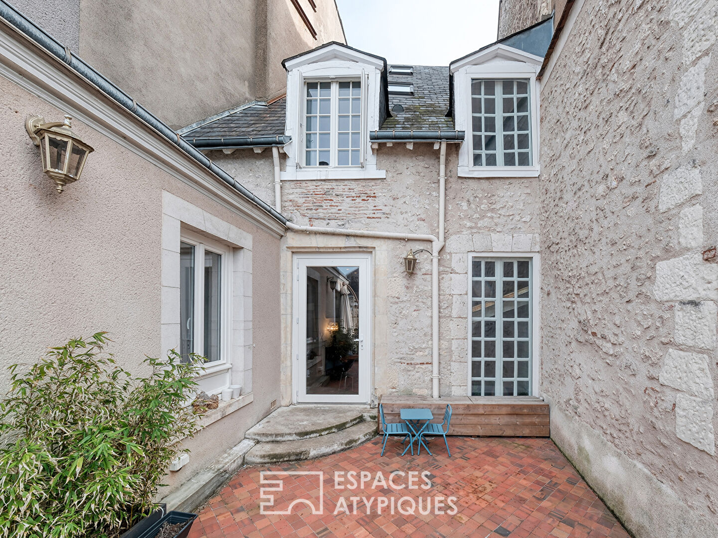 Triplex with a townhouse feel