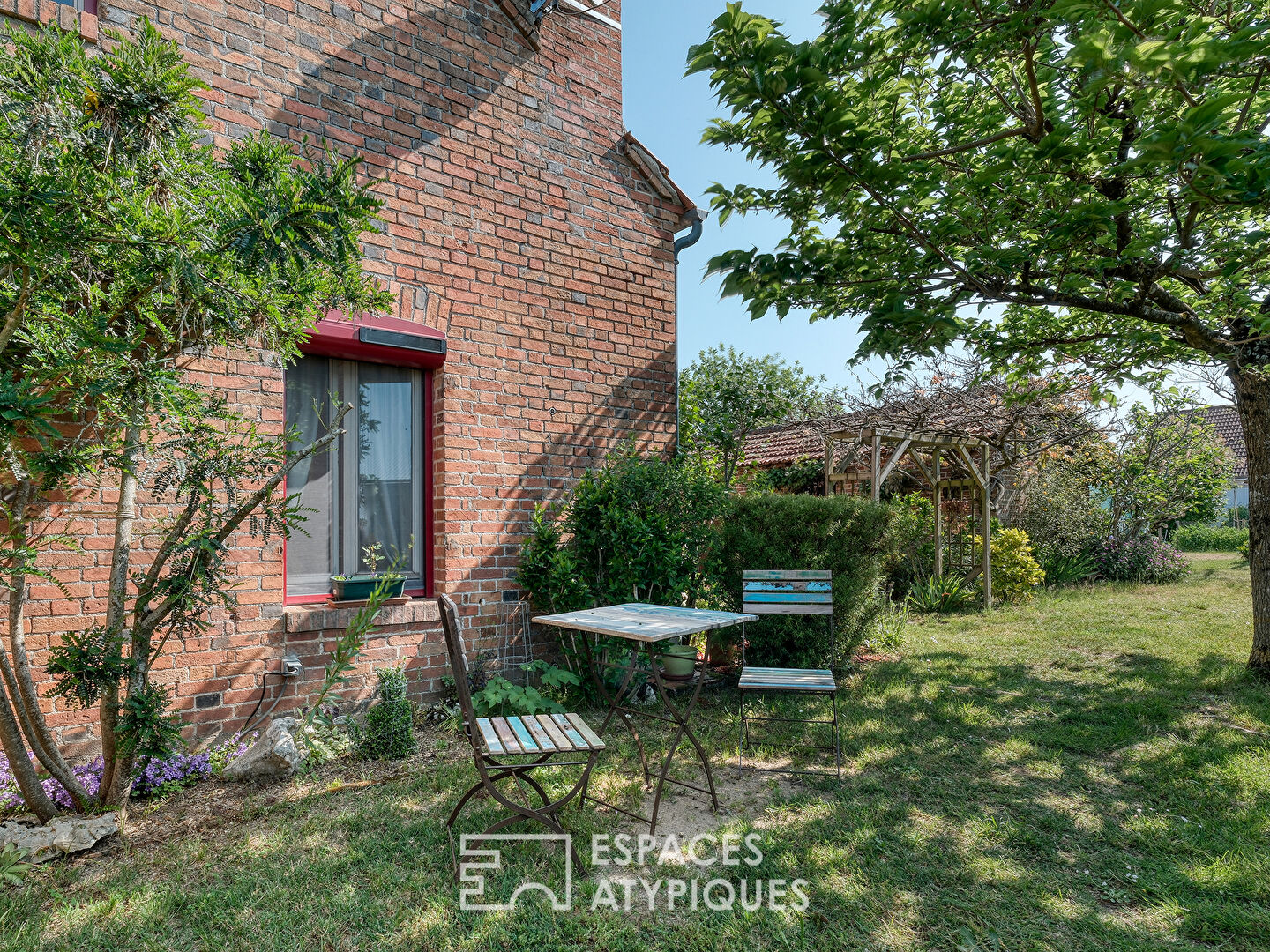 Typical brick house with bucolic garden