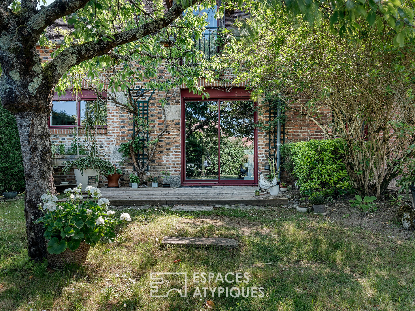 Typical brick house with bucolic garden