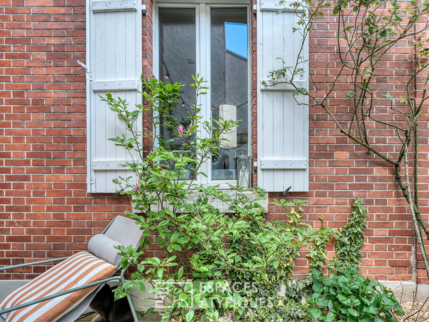 Appartement au charme unique et son jardinet