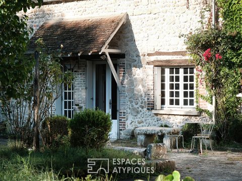 Character house with garden and fishpond