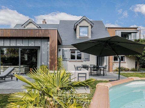 Renovated house with cubic extension, garden and swimming pool