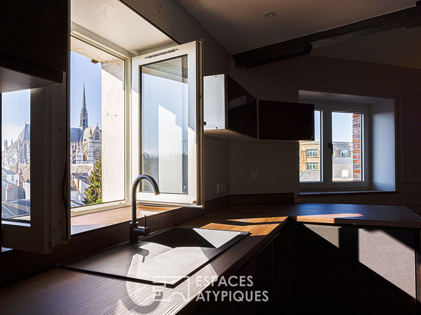 Duplex esprit loft vue cathédrale