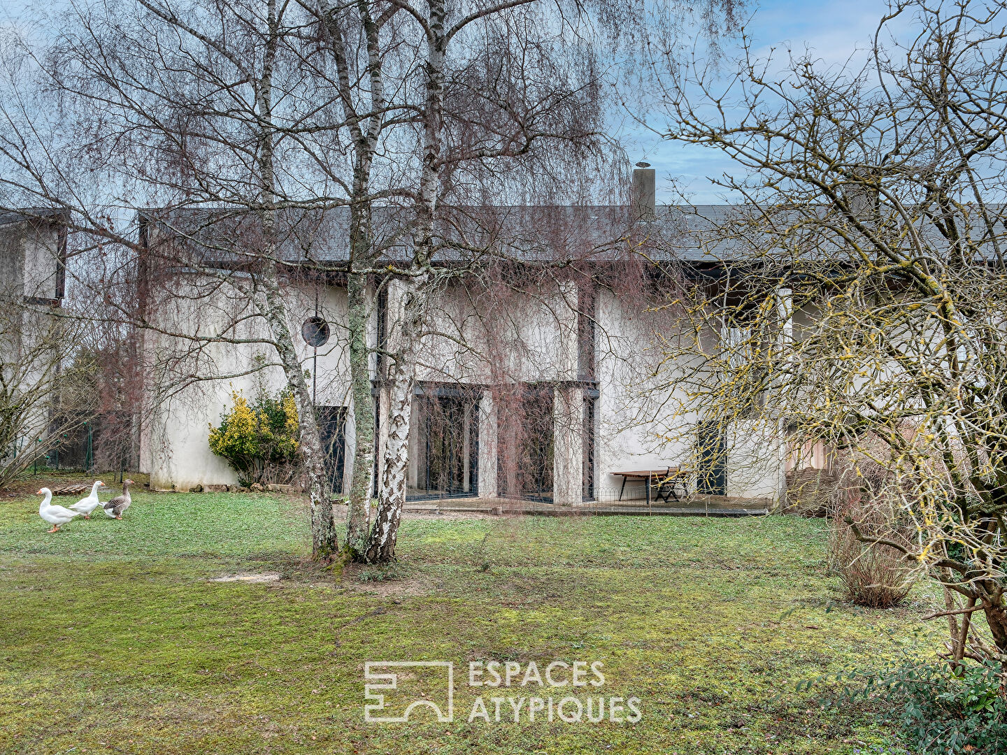 Duplex contemporain avec jardin