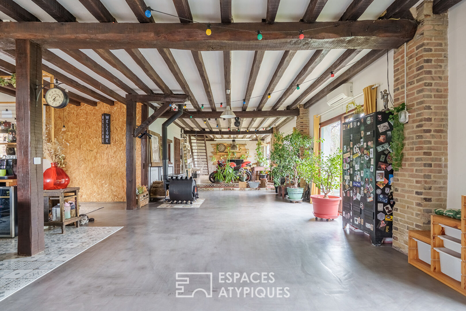 Maison de caractère, esprit loft au vert