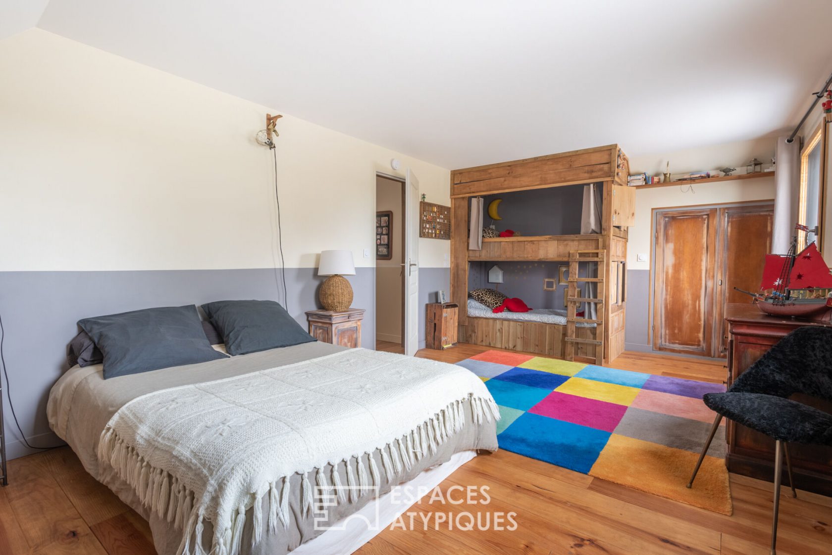 Chaleureuse maison en bois dans son écrin naturel