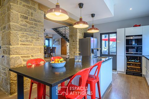 Renovated farmhouse and its outbuildings