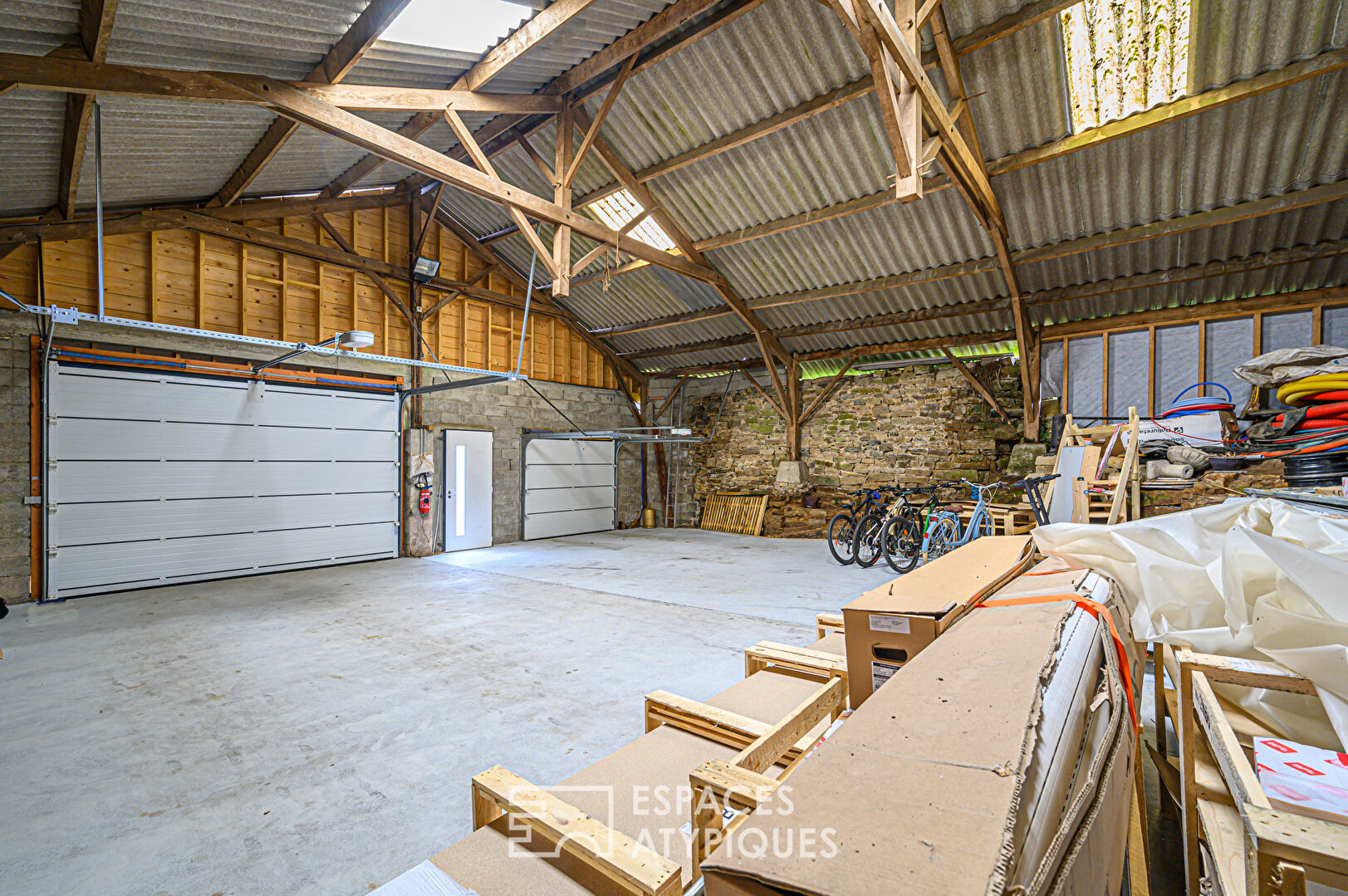 Renovated farmhouse and its outbuildings