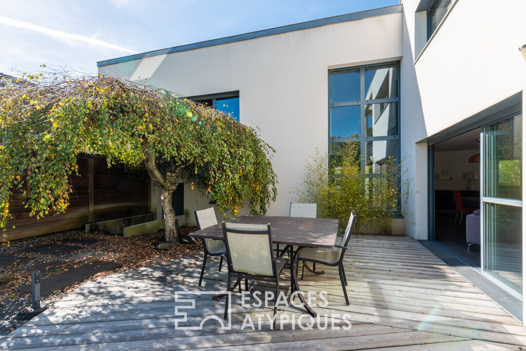 Maison d’architecte avec terrasse et jardin