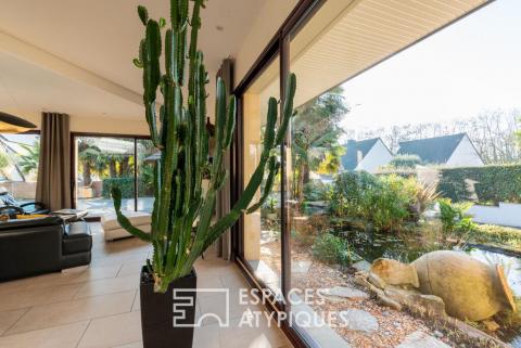 Villa contemporaine et son oasis tropicale