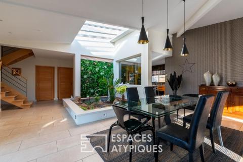 Villa contemporaine et son oasis tropicale