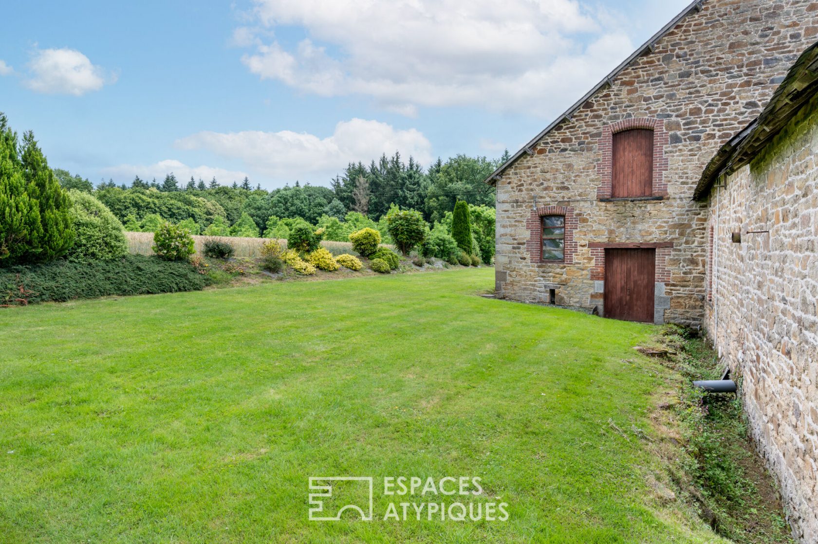 Longère and its stable in the Breton countryside