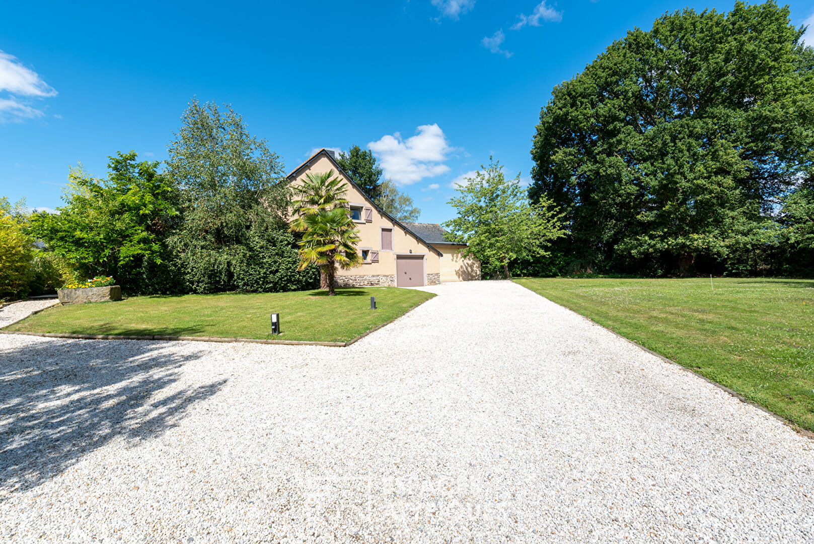 The farmhouse in its green setting