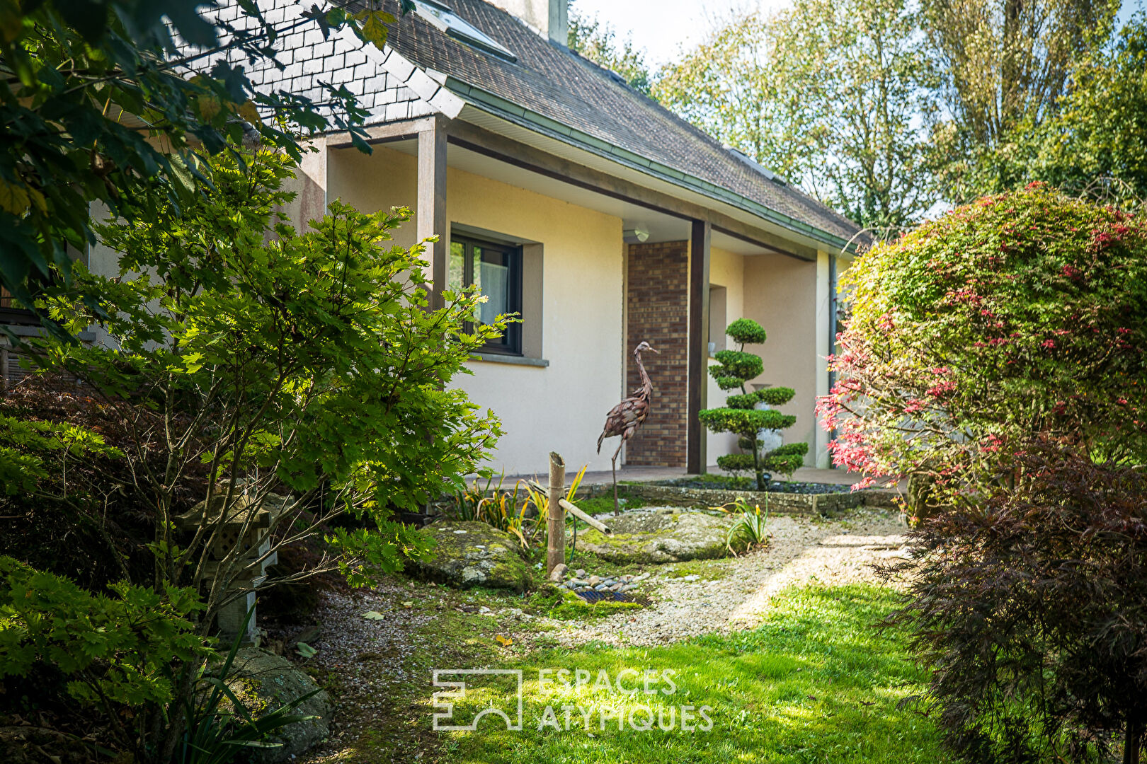 Contemporary on one level nestled in its exceptional garden