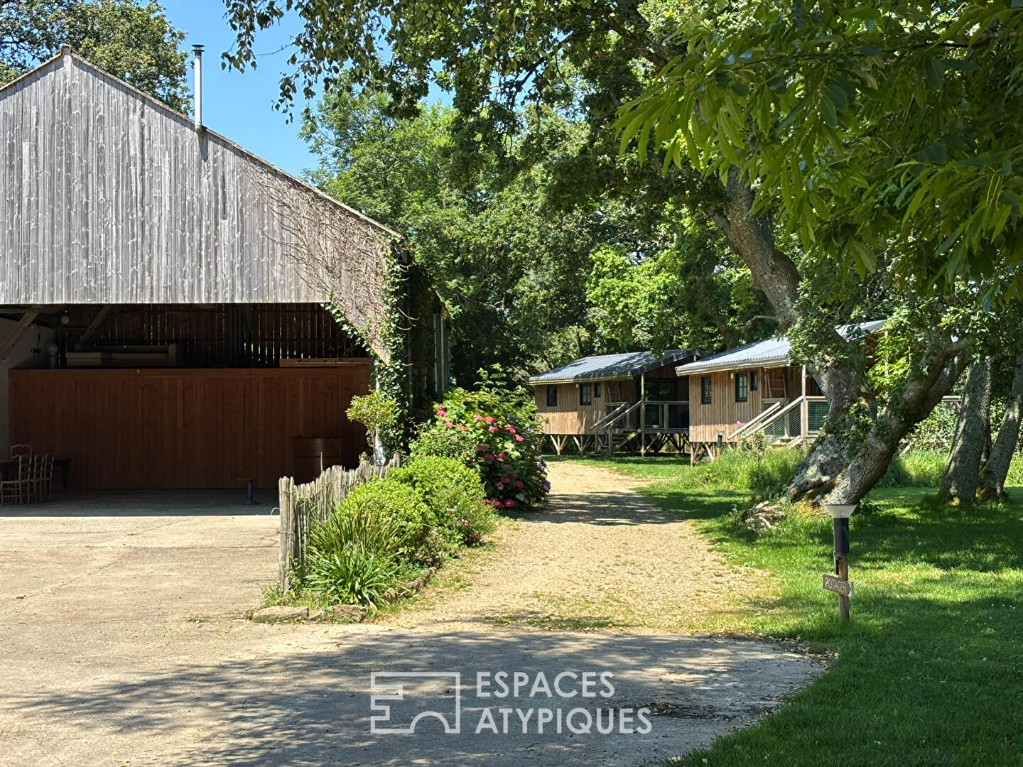 Property and its eco lodge nestled in a green setting
