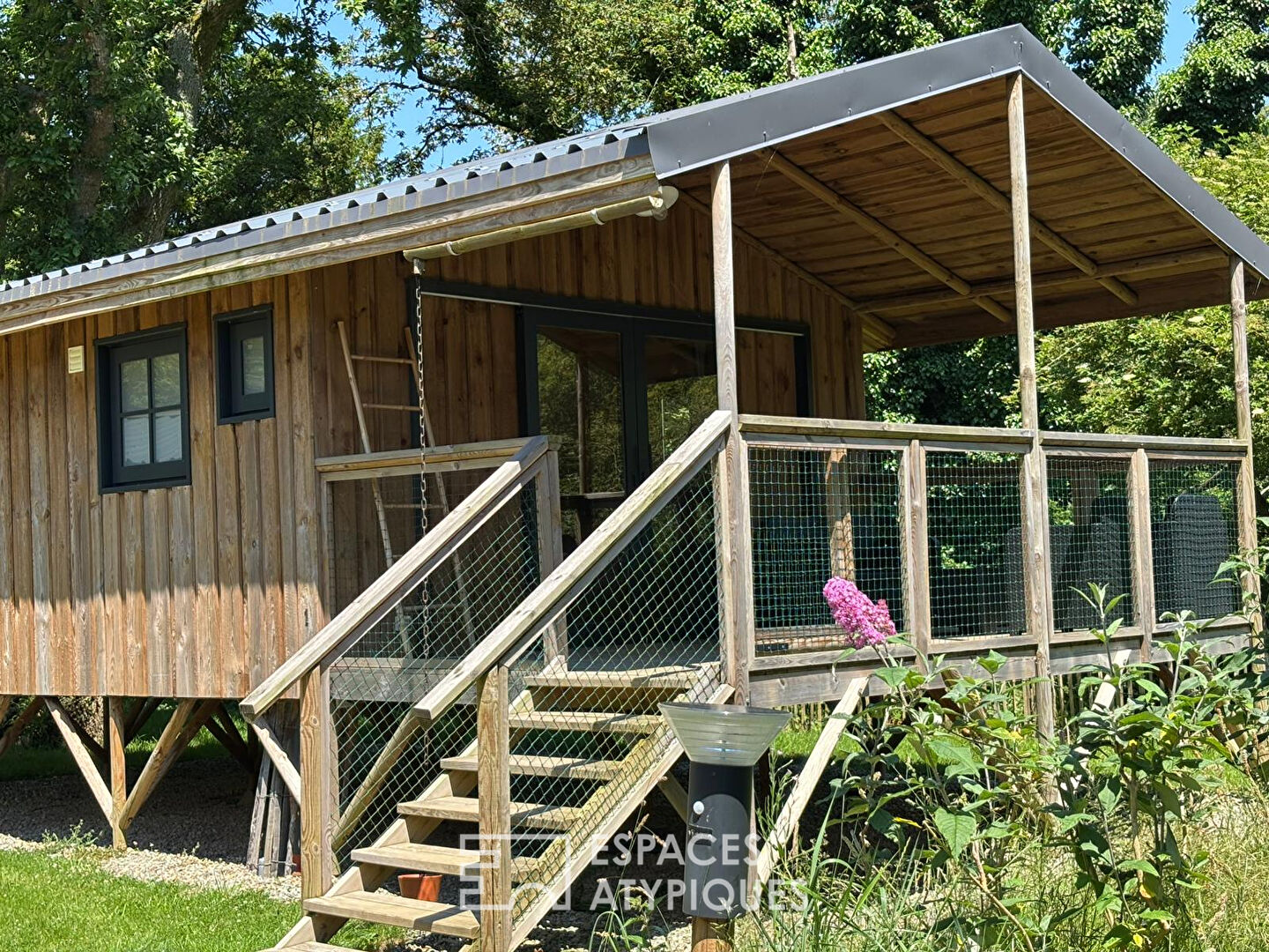 Property and its eco lodge nestled in a green setting