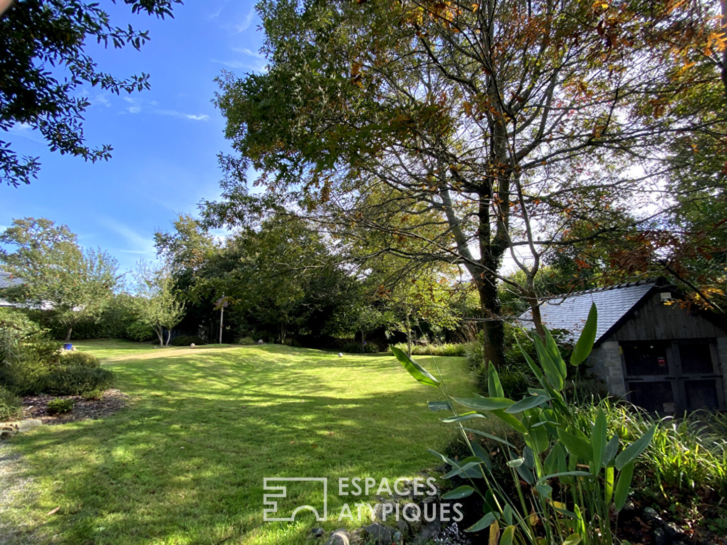 Maison moderne au calme avec suite parentale et jardin paysager