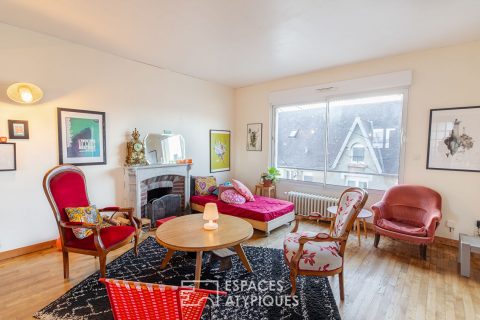 Duplex inspirant avec cheminée et jardin partagé
