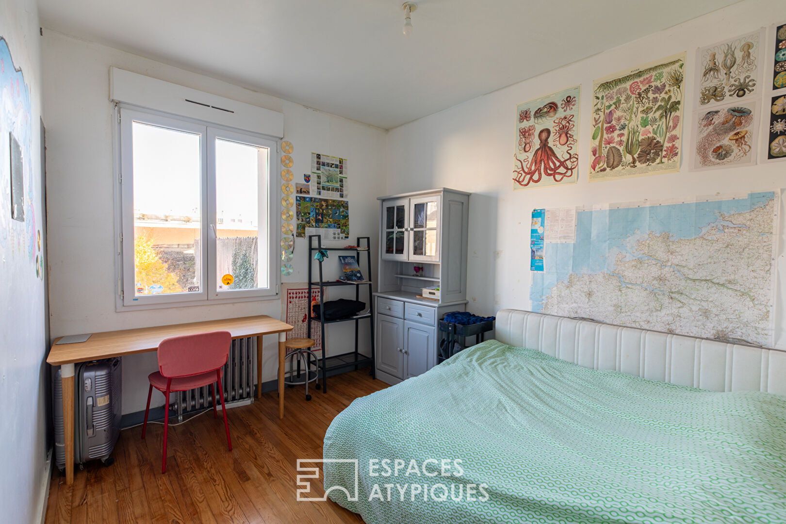 Esprit maison de ville : duplex atypique avec jardin partagé