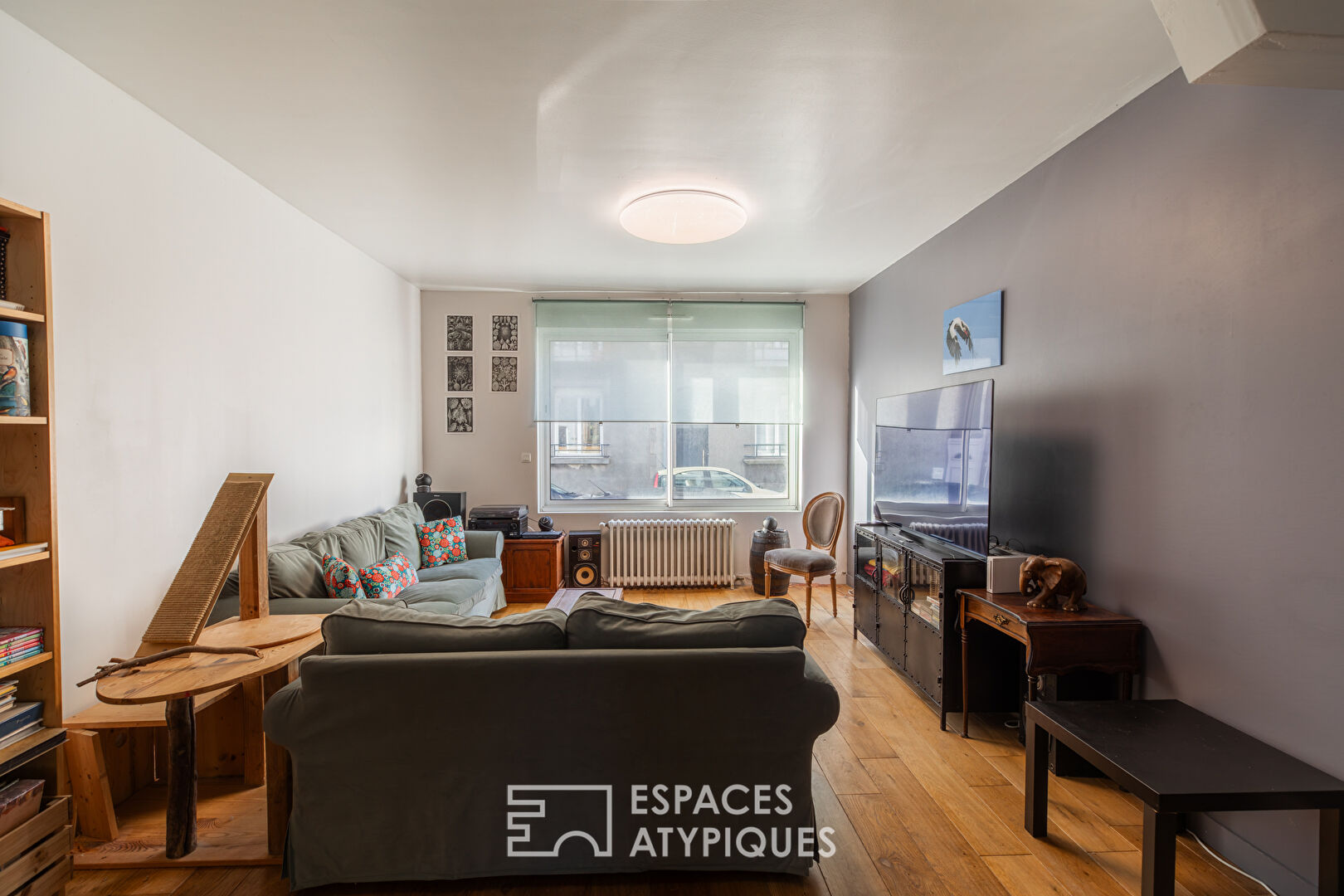 Esprit maison de ville : duplex atypique avec jardin partagé